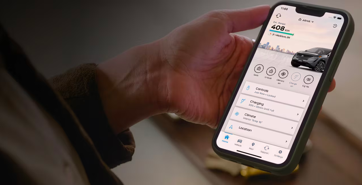 NissanConnect app on smartphone showing Nissan ARIYA controls, charging status and remote start features